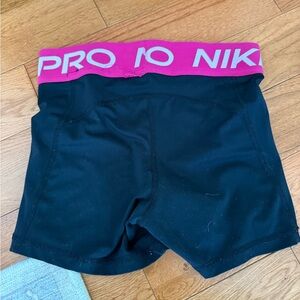 Nik Pro shorts. Size xs. Pink and black.